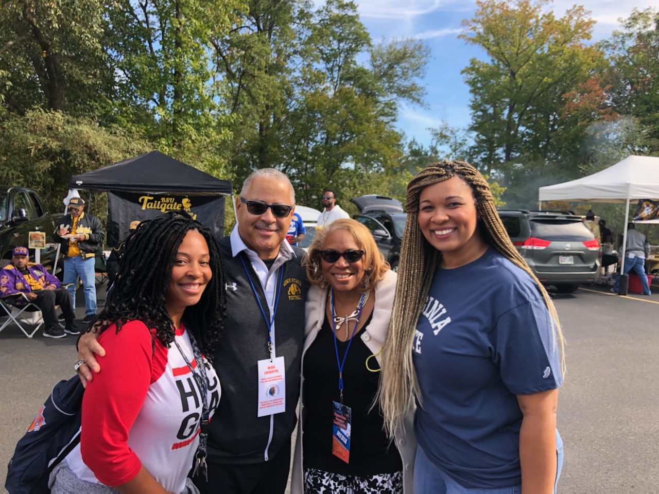 Goings with his wife, Dr. Donna Powell-Goings, and two former sports information colleagues at Virginia State Homecoming 2019.